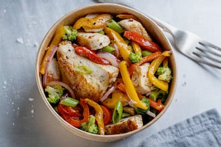 Chicken and organic roasted vegetables over rice