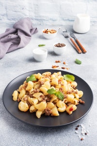 Pork Ragout With Gnocchi and a Creamy Mushroom Parmesan Sauce